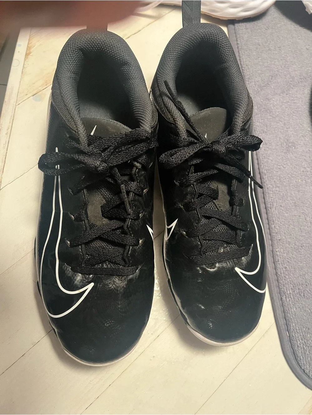 Nike Kids Black Sneakers with White Swoosh